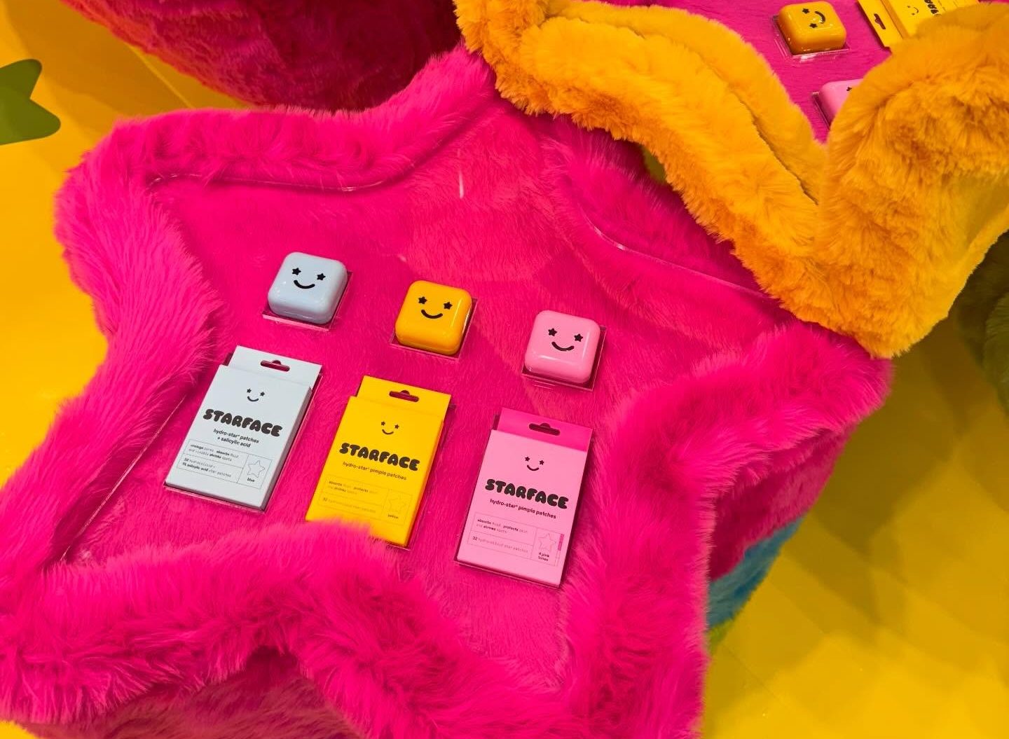 Teenage skincare products in bright, furry star