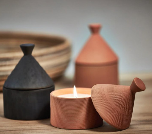 Ceramic pots with candles inside