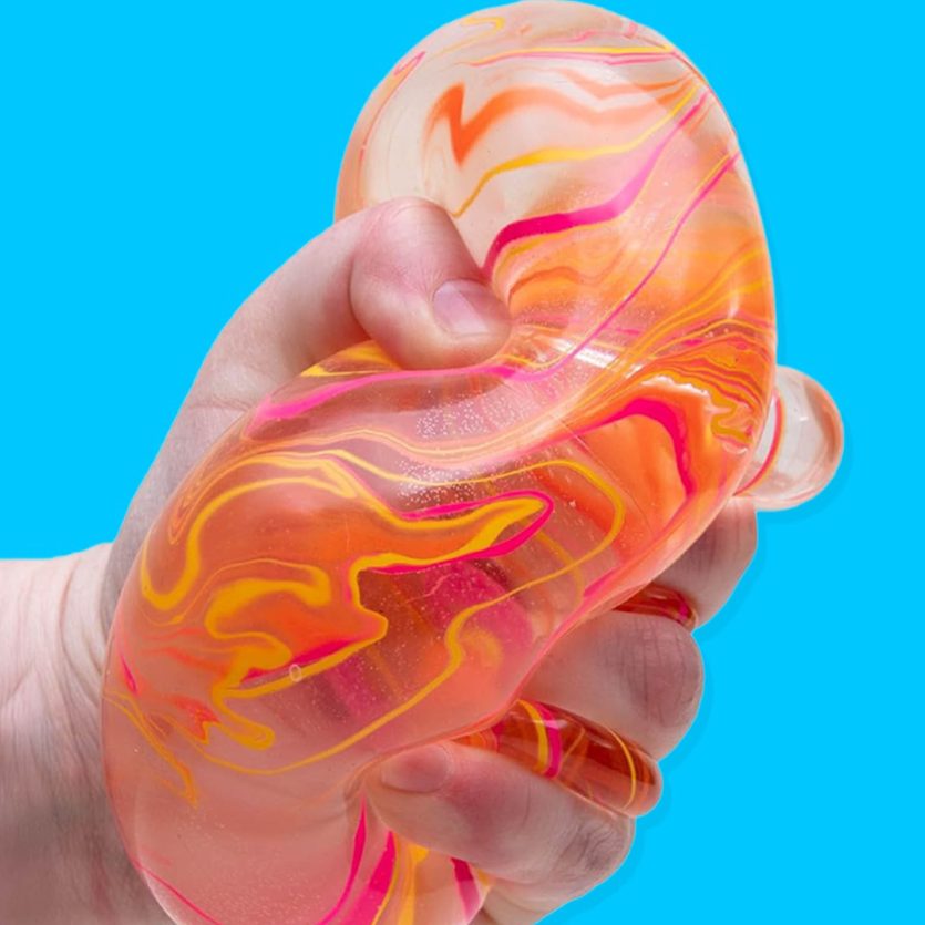 Sensory toy in bright colours on blue background